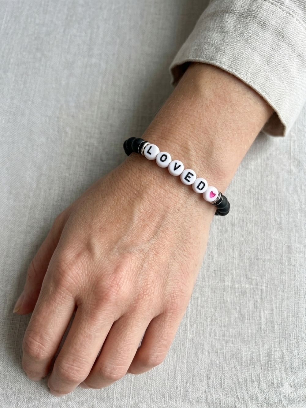 Handmade 7 Inch Stretch Loved Letter Bead Bracelet in Black and White